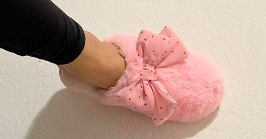 Woman's Foot wearing a Joyspun Bow Slipper