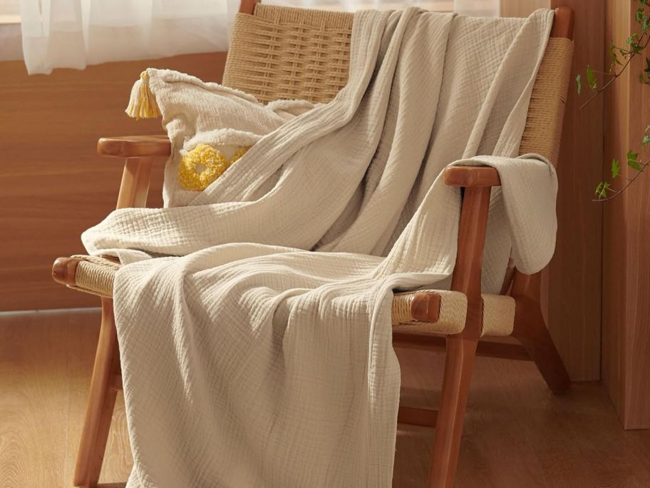 beige bedsure throw blanket draped on chair