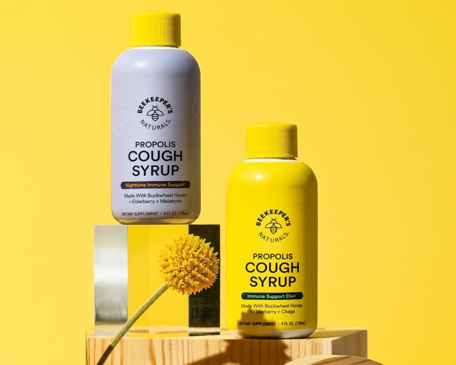 two bottles of beekeepers adult cough syrup