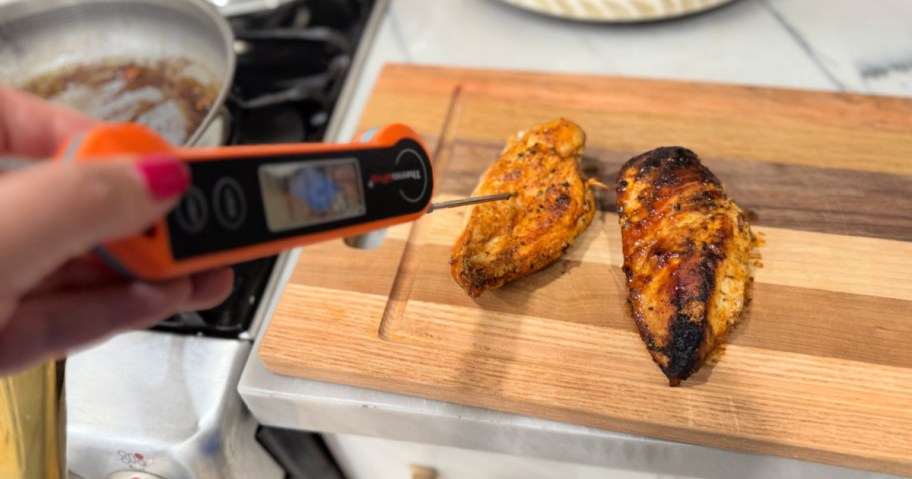 checking the internal temperature of chicken 