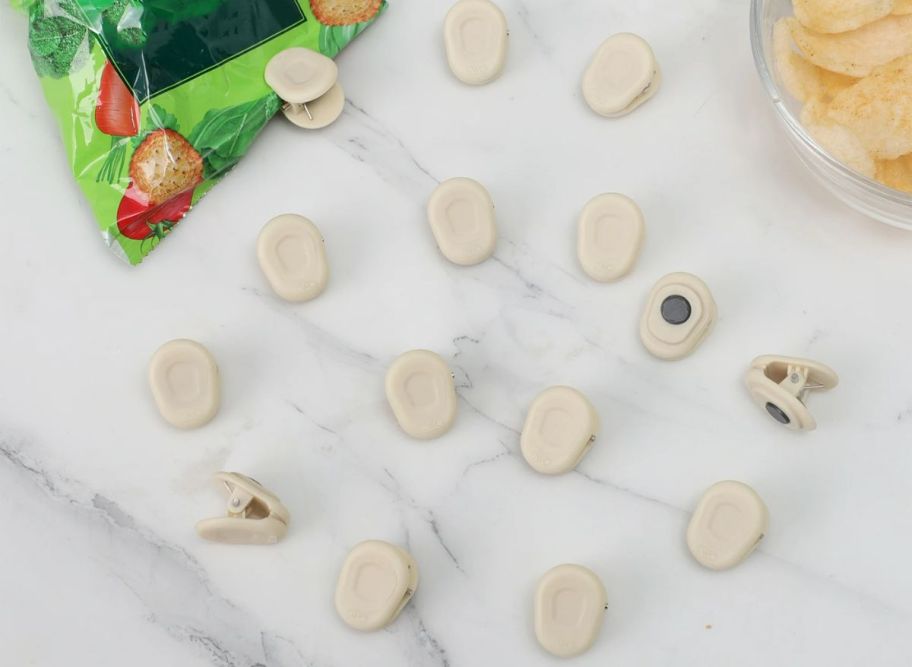 15 mini bag clips on a kitchen counter