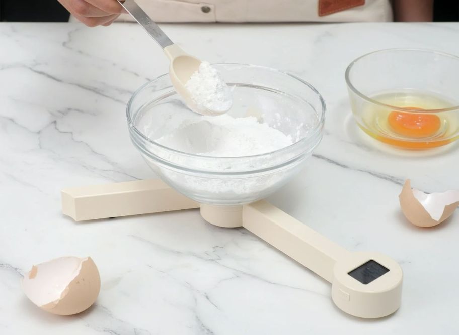 a foldable kitchen scale on a kitchen counter