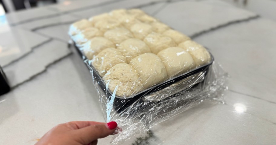 frozen dough rising in baking pan