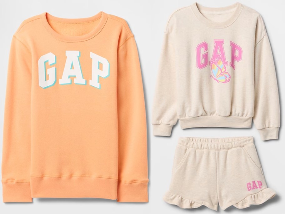 orange sweatshirt and gray top and shorts 