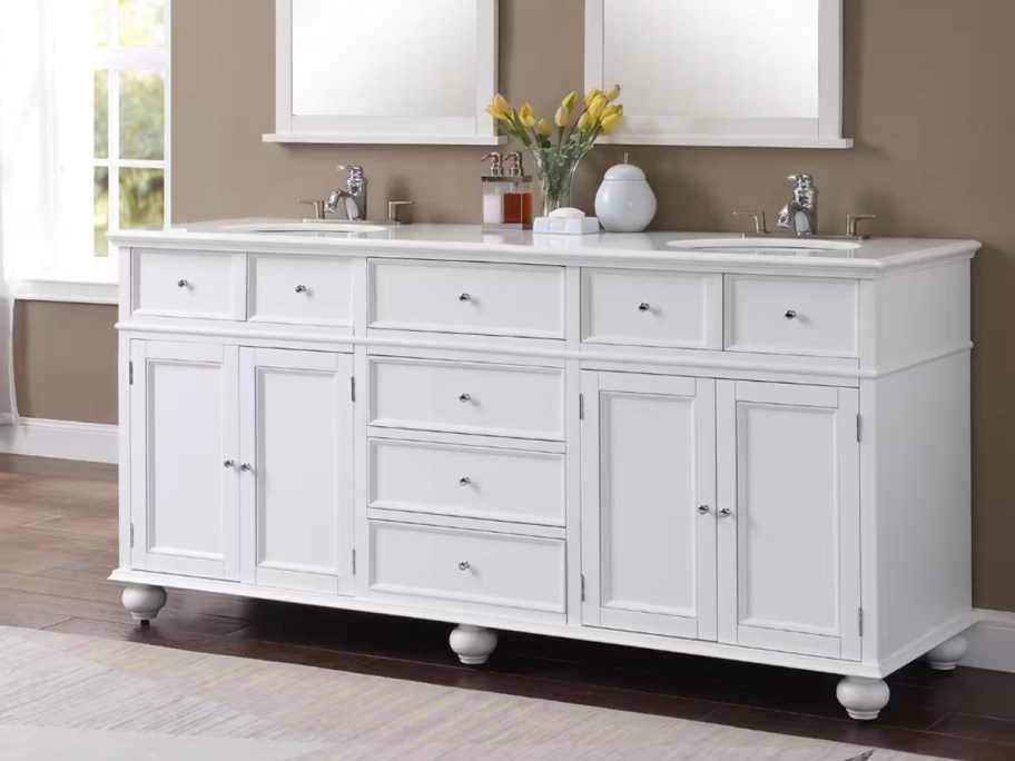 double bath vanity with flowers on top 