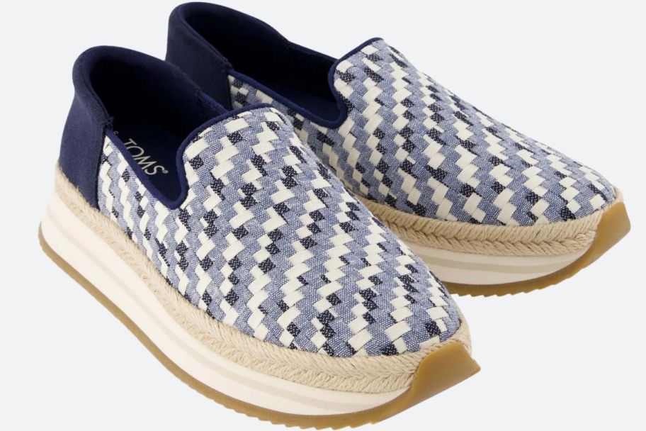 a pair of womens blue and white denim slip on sneakers