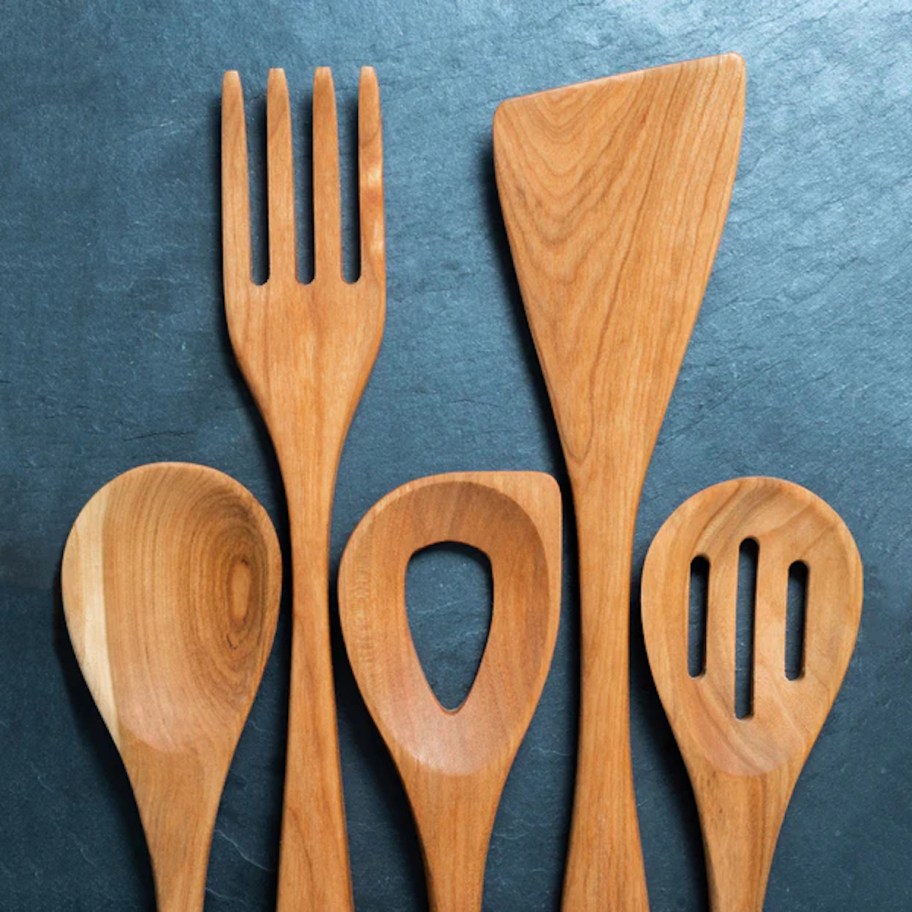 wood cooking utensils on gray background