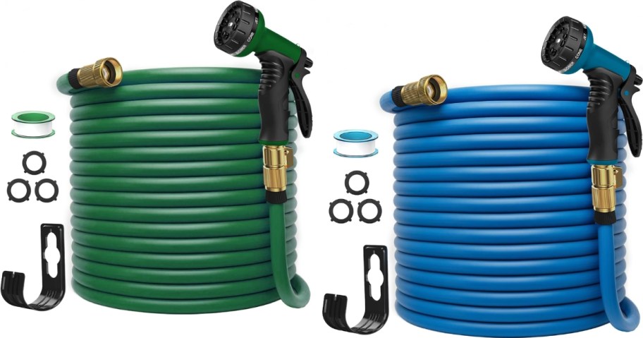 water hoses coiled up with sprayers and accessories next to them