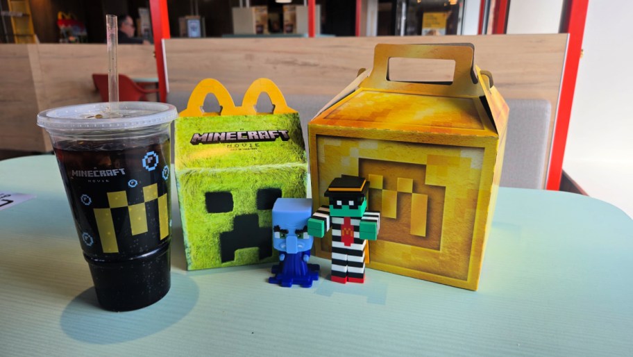 both adult and kids minecraft themed happy meals displayed on a table