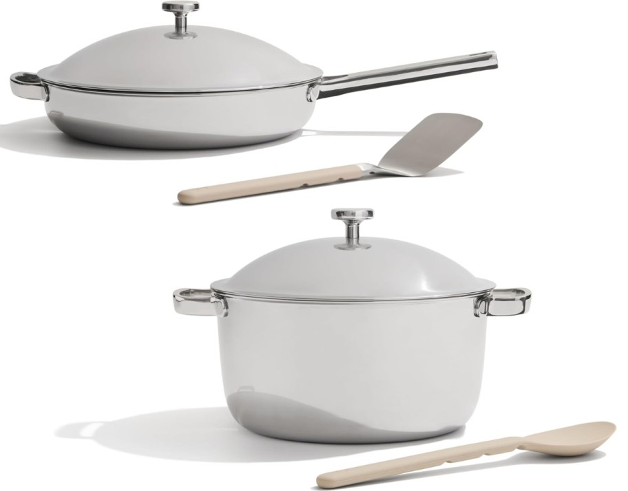 a set of 2 cooking pots and pans with lids and 2 utensils