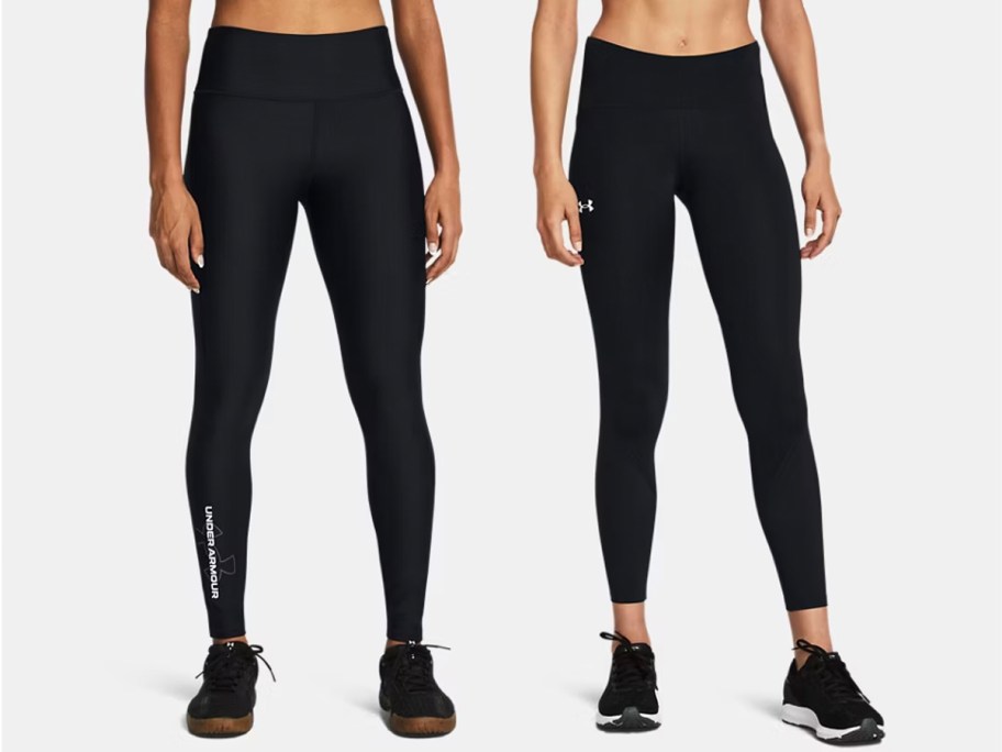 two women wearing black under armour leggings 