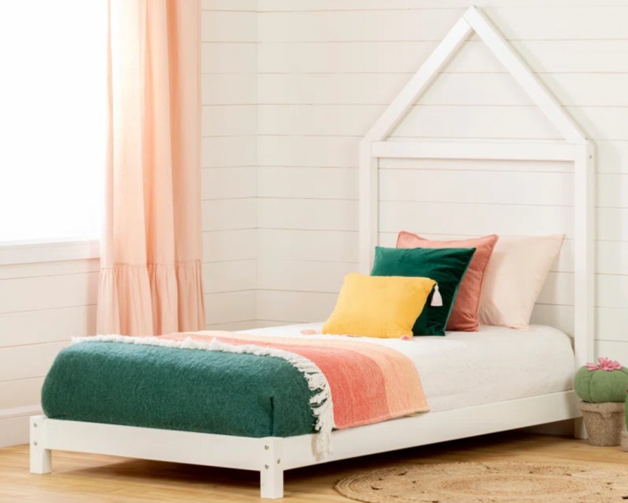 white frame platform bed