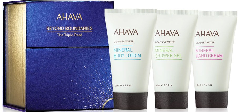 three tubes of Ahava skincare products with blue gift box