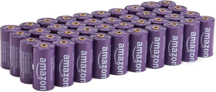 many purple rolls of dog waste bags