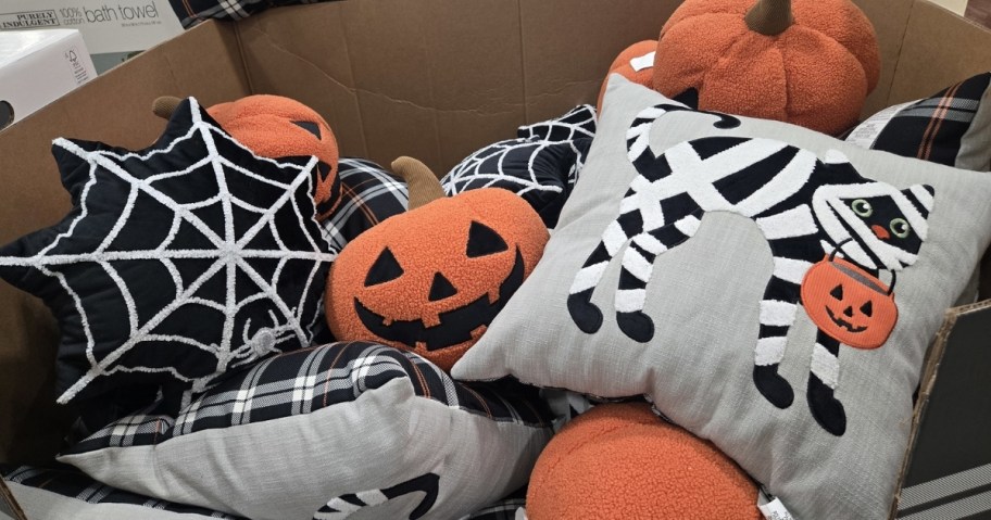 three styles of halloween throw pillows at costco