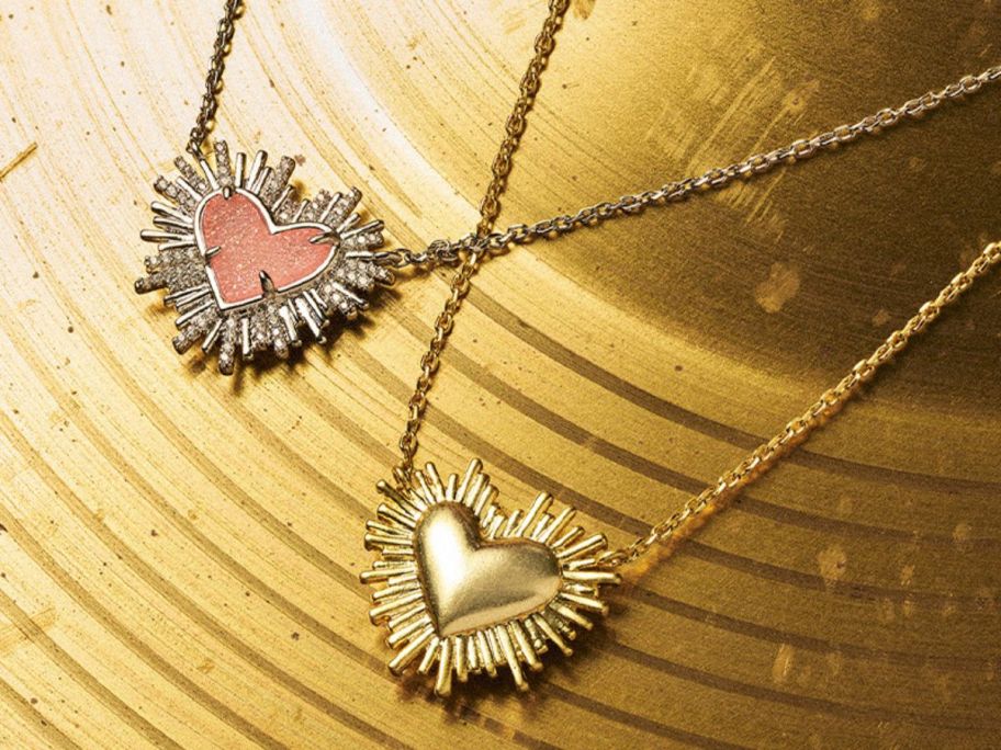 Two heart necklaces on a cymbal