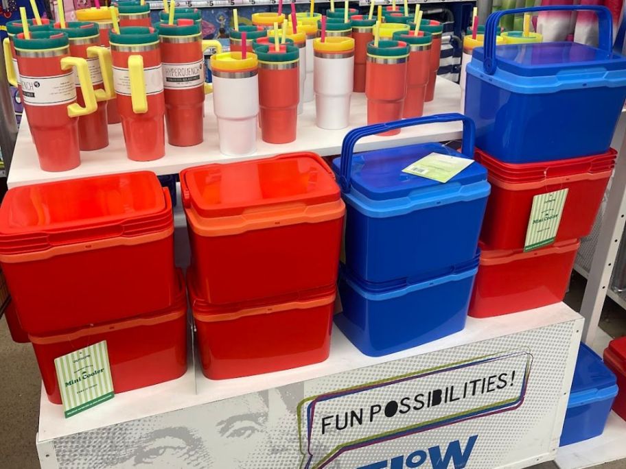 Several red and blue coolers