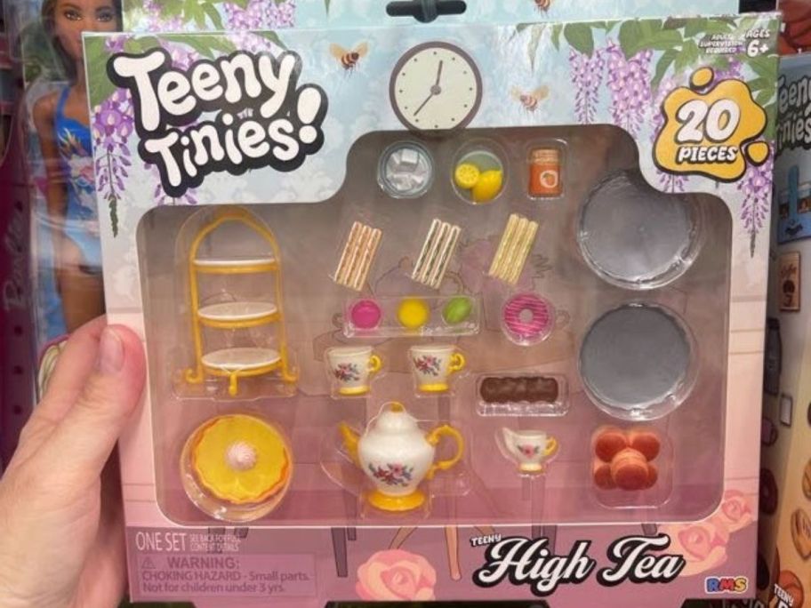 A box featuring a teeny toy set