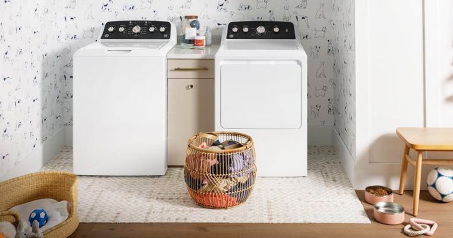 white and black washer dryer set in laundry room