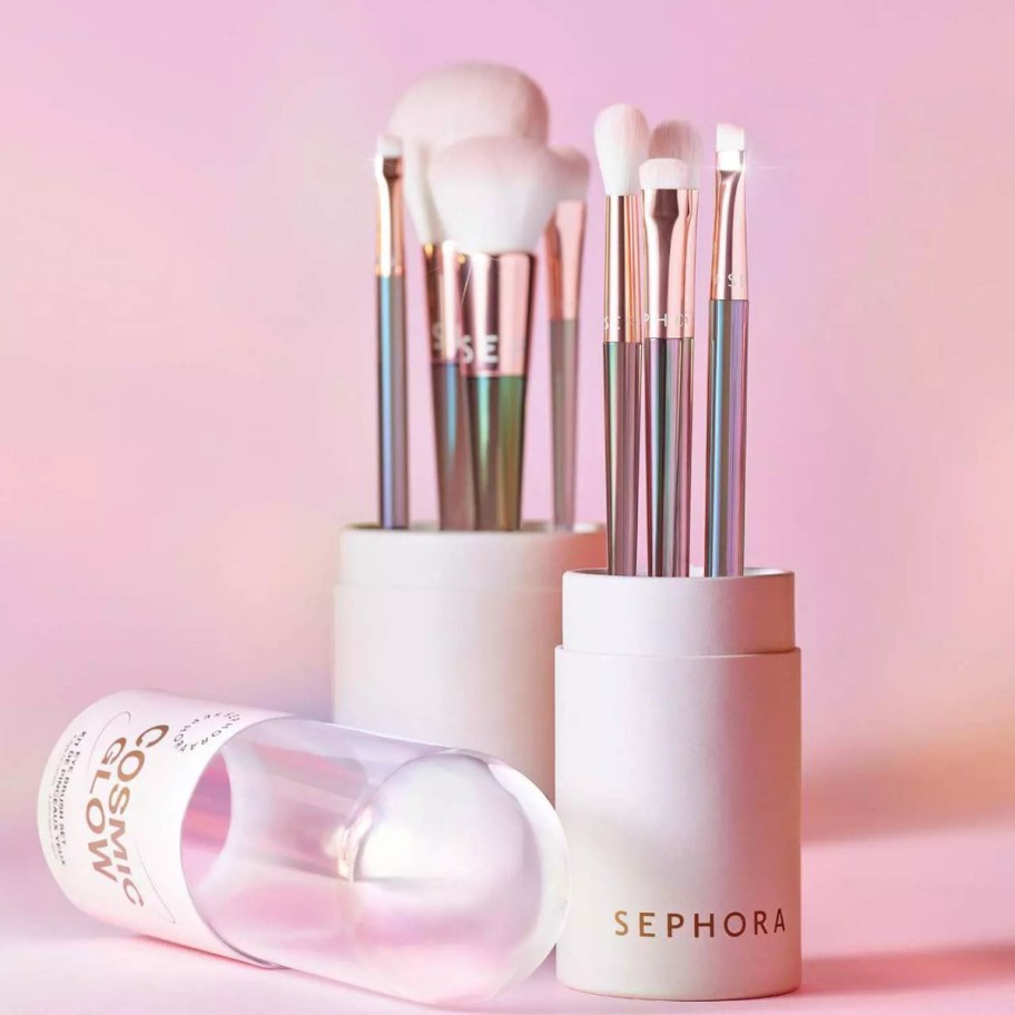 2 sets of pink and silver makeup brush sets