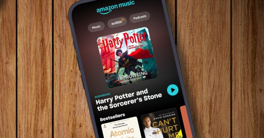 a smart phone with Amazon Music app open to the free Audible audiobook section 
