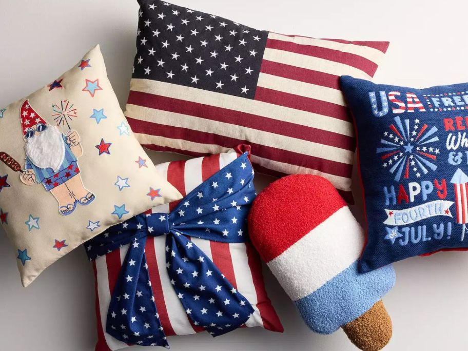 A pile of various Celebrate Together Americana Collection throws from Kohl's