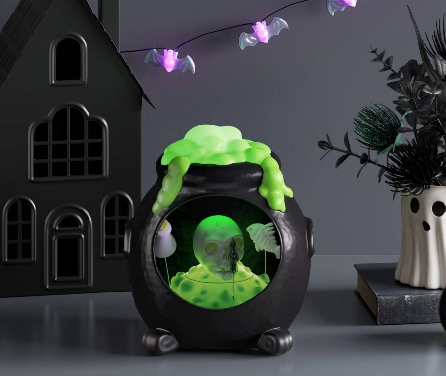 a light and sound witches cauldron decorative prop