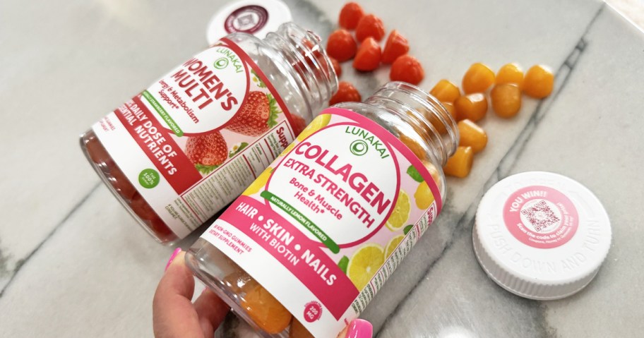 pouring out bottles of Lunakai gummy supplements