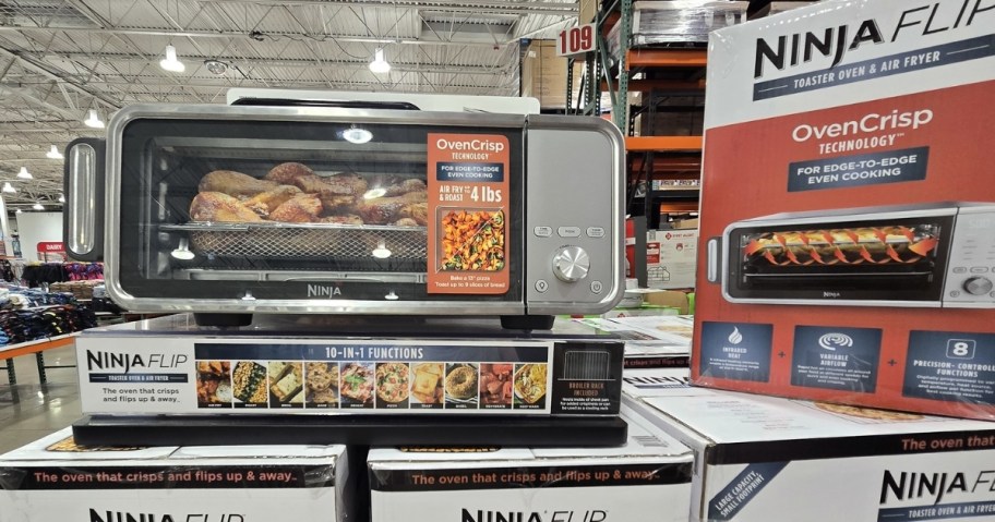 Ninja Flip 10-in-1 Countertop Oven on display at costco with boxes