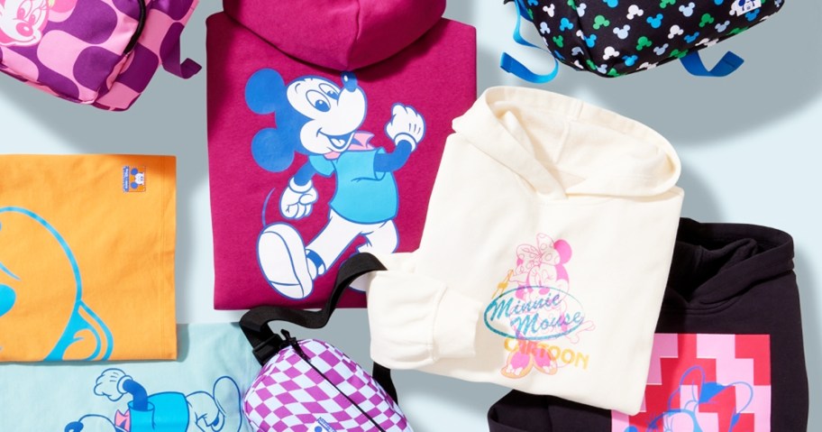 variety disney sweatshirts and shirts on blue background