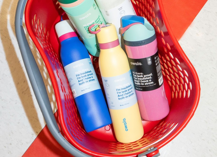 colorful Owala water bottles in red Target shopping basket