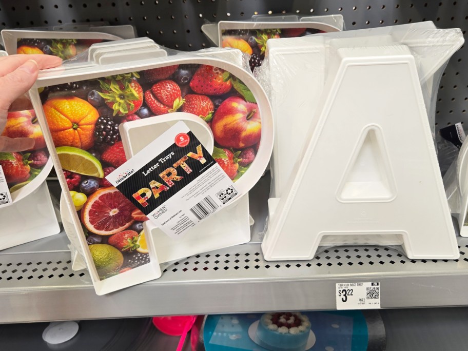 sets of white fillable trays in the shape of letters that spell PARTY