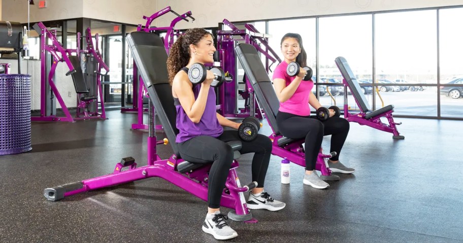 two teen girls working out at Planet Fitness