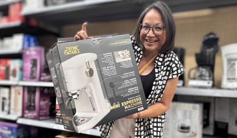 woman holding box with thyme and table espresso machine at walmart