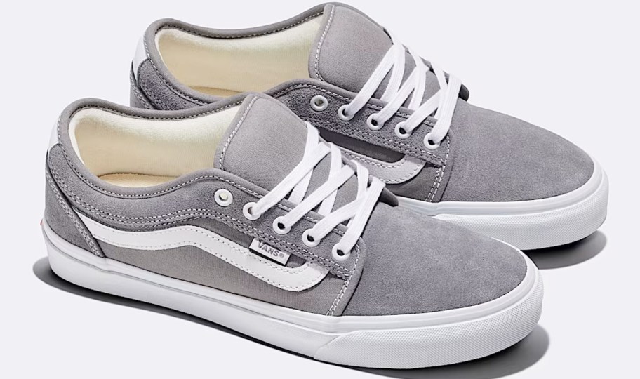 pair of grey and white vans sneakers
