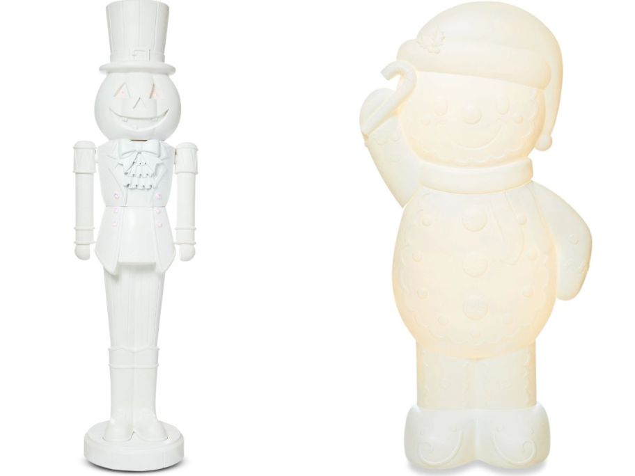 Stock image of two paint it yourself Pumpkin Nutcracker and snowman blow molds