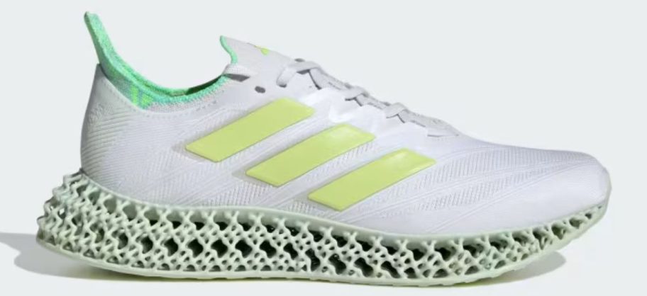 green, yellow, and white adidas Women's 4DFWD 4 Running Shoe stock image