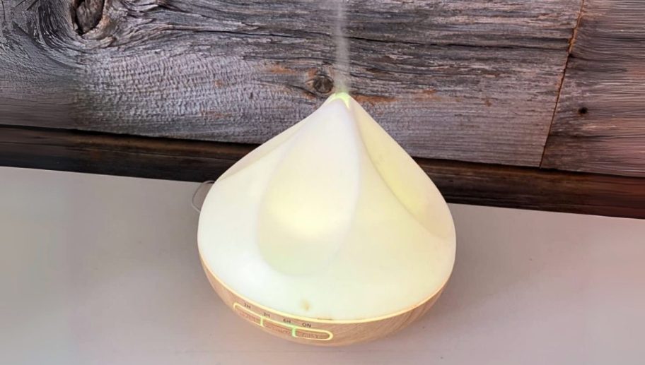an aromatherapy diffuser with a white led light