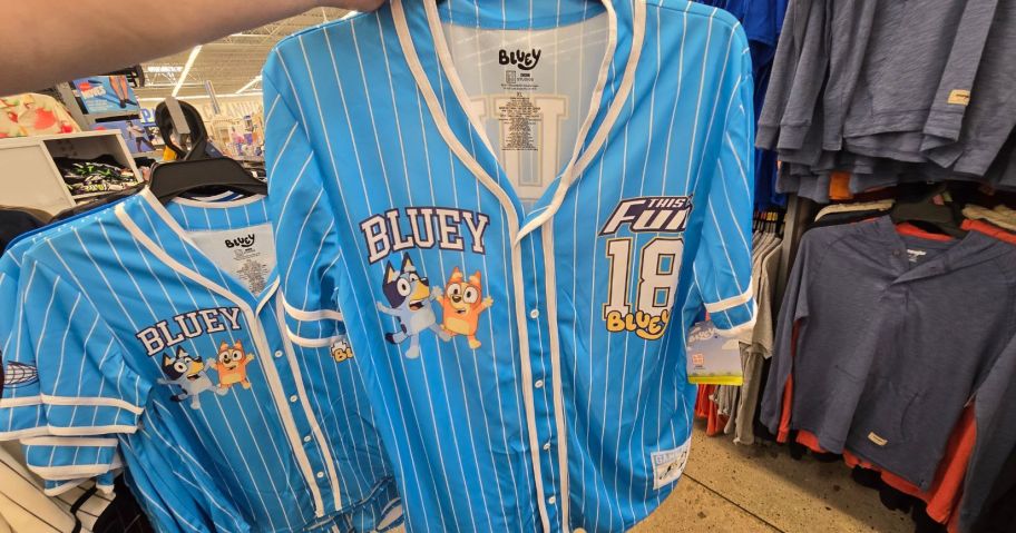 Bluey Men's Baseball Jersey in hand in store