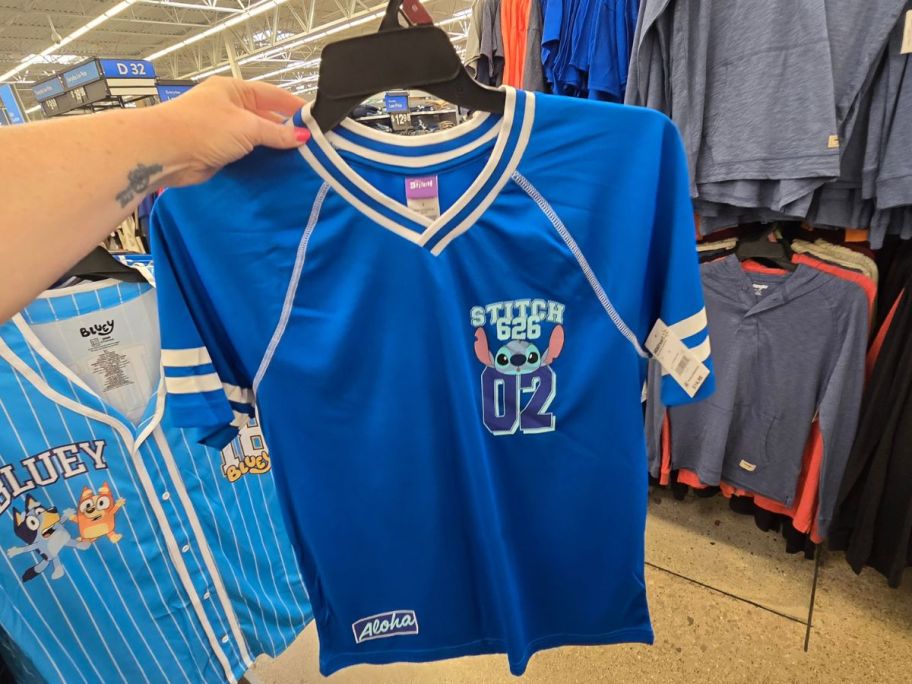 Disney Stitch Men's Graphic Baseball Jersey in hand in store