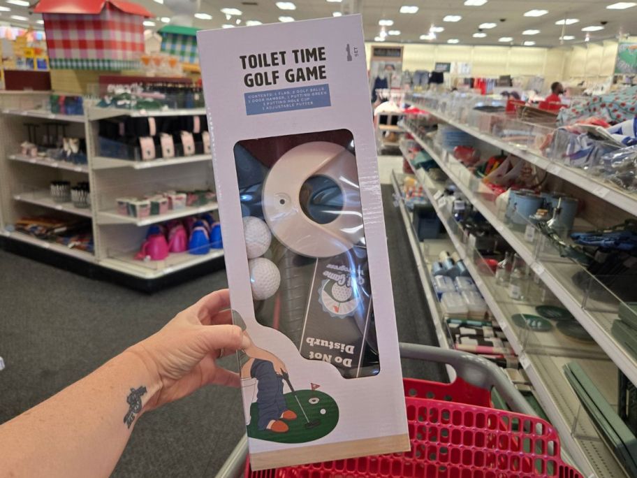 Toilet Time Golf Game box in hand in store