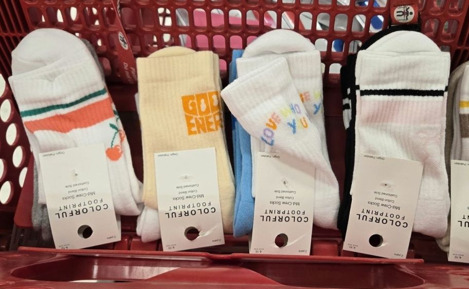 four crew sock 2-packs in a target shopping cart