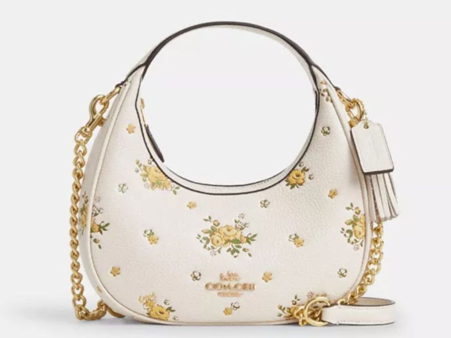 white and yellow Coach Carmen Mini Crossbody Bag