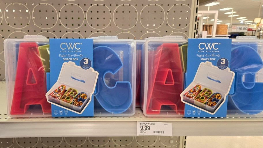 two ABC letter shaped snackle boxes on a store shelf