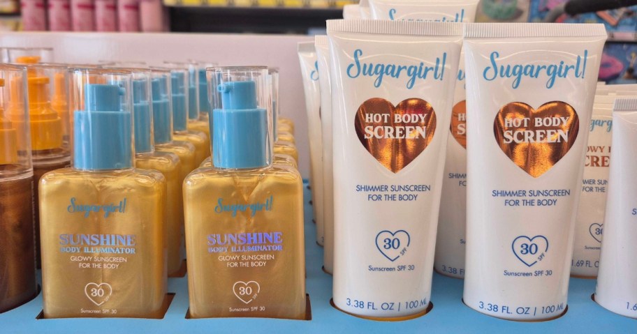 bottles and tubes of Sugargirl! brand lotions on a store shelf