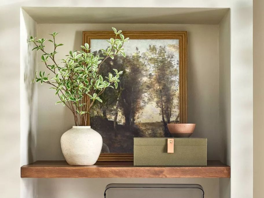 Hearth & Hand with Magnolia Faux Variegated Terminalia Leaf Arrangement in vase on table