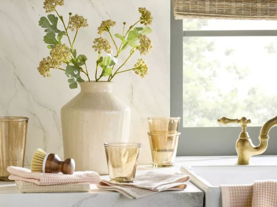 Hearth & Hand with Magnolia 9' Textured Ceramic Decorative Vase with stems in on on counter