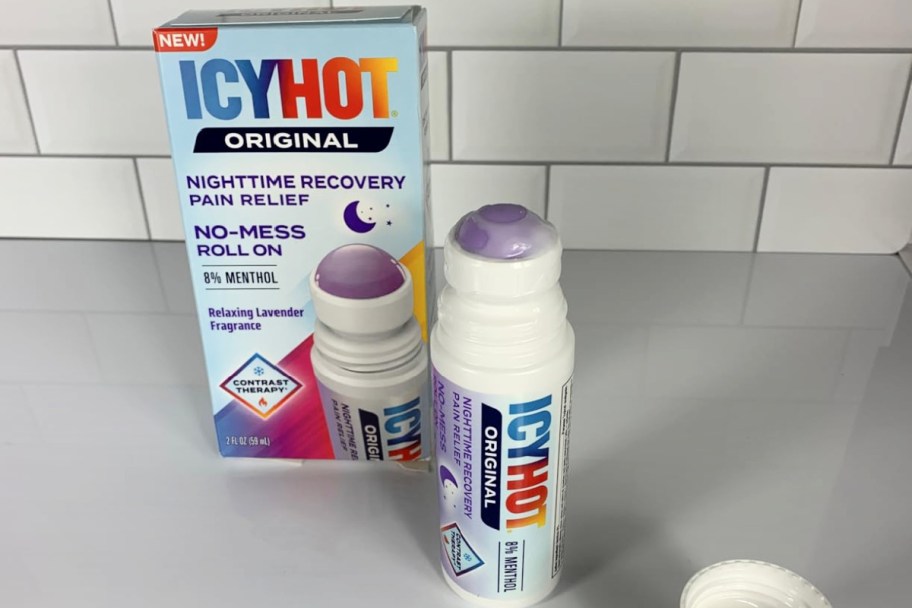 icy hot nighttime roll on and package on a counter