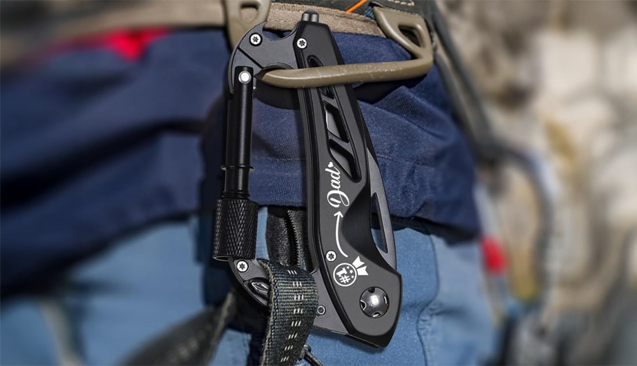 person wearing a multitool knife/keychain on their belt loop