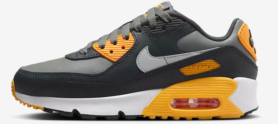 gray, black, and yellow nike air max shoe